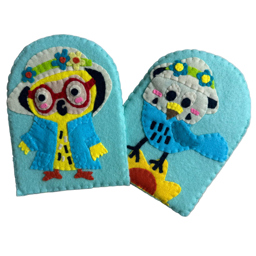 Two handmade felt stick finger puppets featuring cartoon animal characters